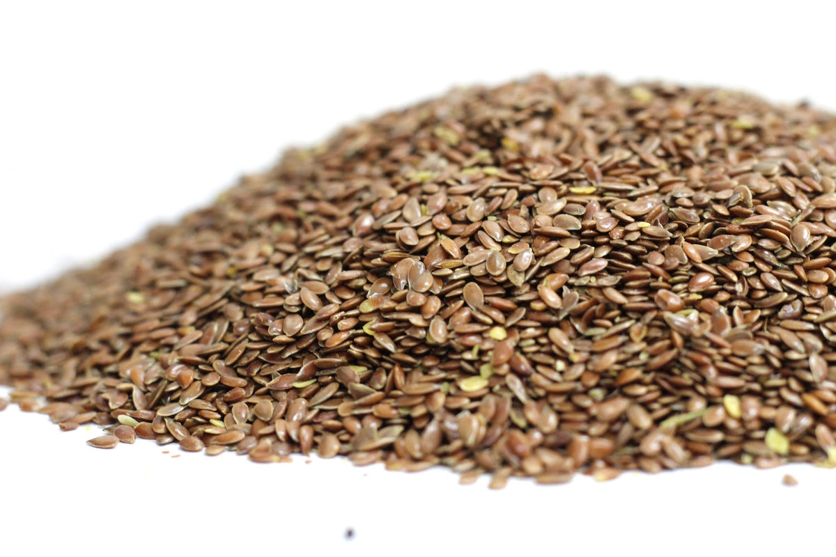 Brown Flax Seeds, close-up heap of whole small brown flax seeds