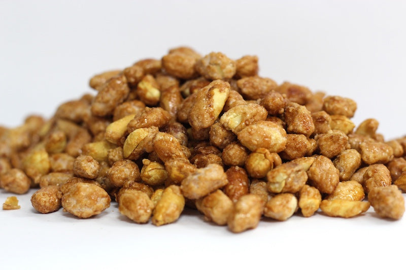 Butter Toasted Peanuts, whole peanuts with a lightly toasted golden-brown surface in a loose heap