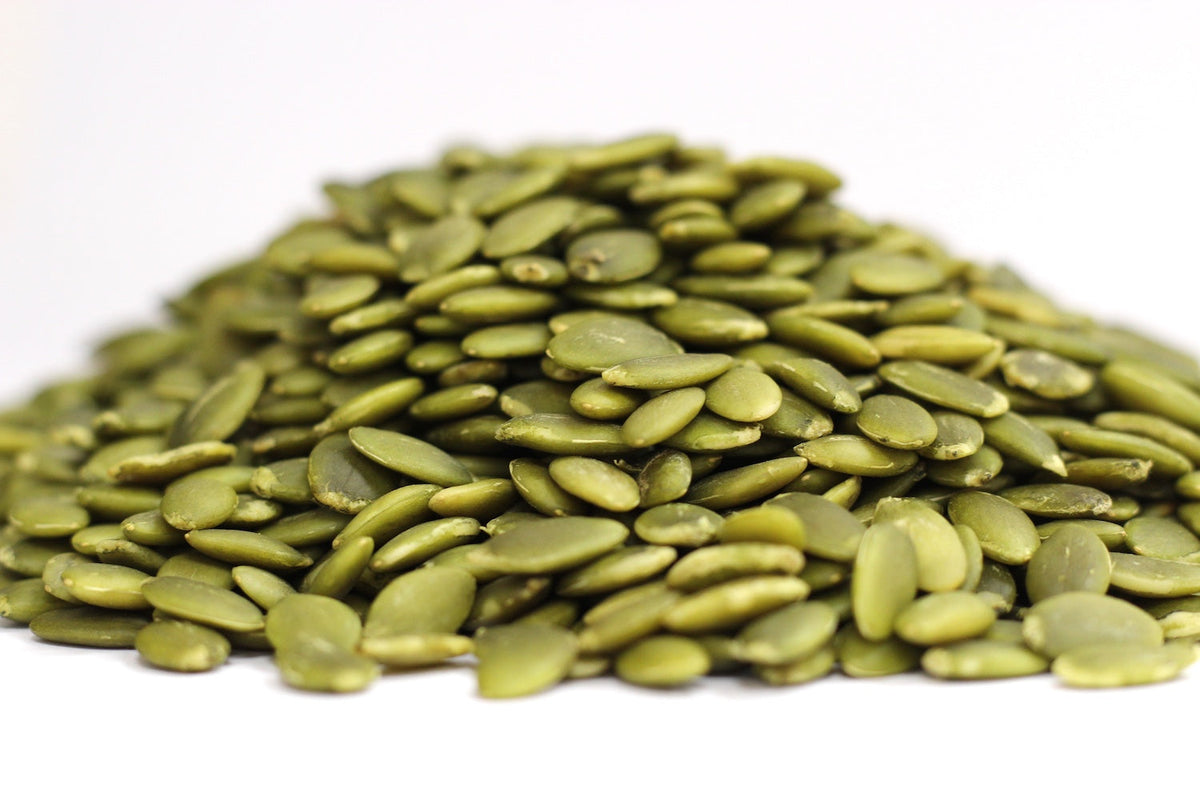 Pumpkin Seeds, whole flat green seeds in a loose pile