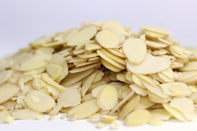 Sliced Almonds, thin ivory almond slices in a loose pile