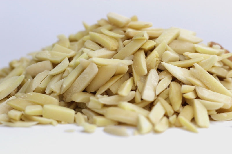 Slivered Almonds, thin ivory almond slivers in a loose pile