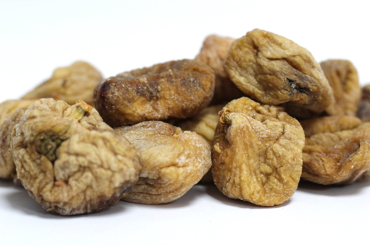 Turkish Figs, whole dried figs with wrinkled tan-brown skins in a loose heap